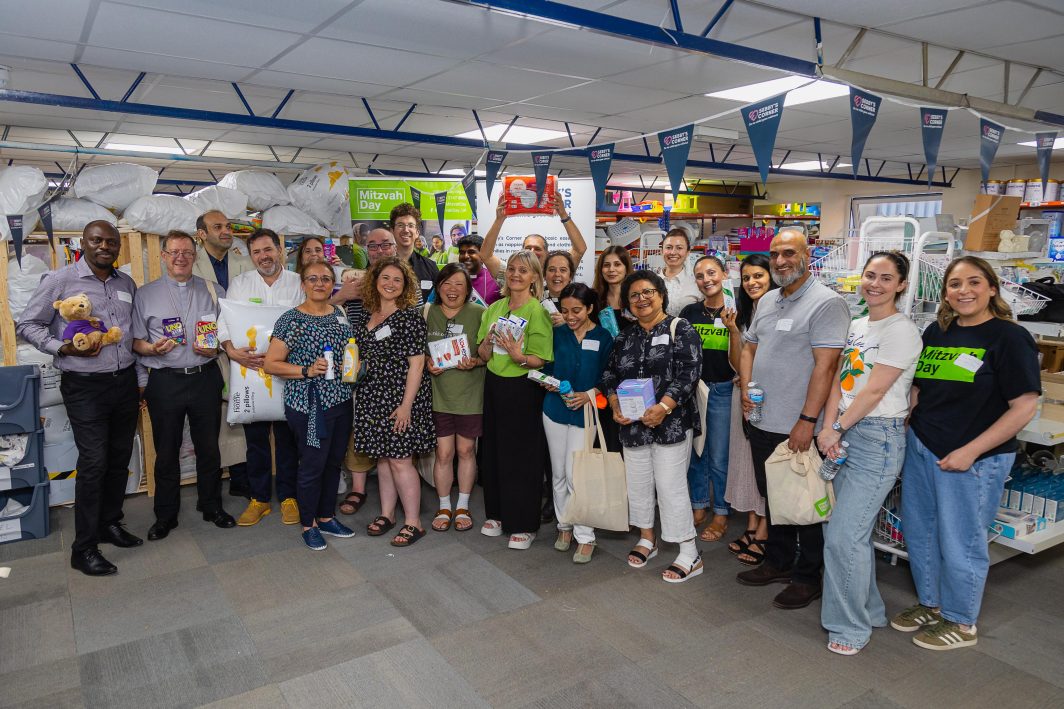 The interfaith leaders with Mitzvah Day and Sebby's Corner teams after the packing