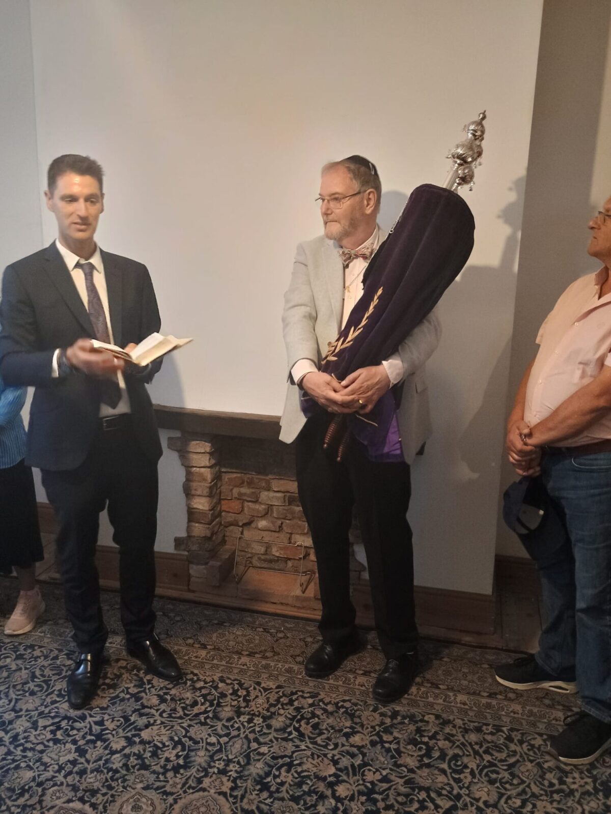 Howard Duckworth with the historic Torah Scroll